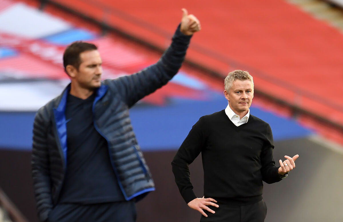 Manchester United manager Ole Gunnar Solskjaer (right) and Chelsea manager Frank Lampard on the touchline