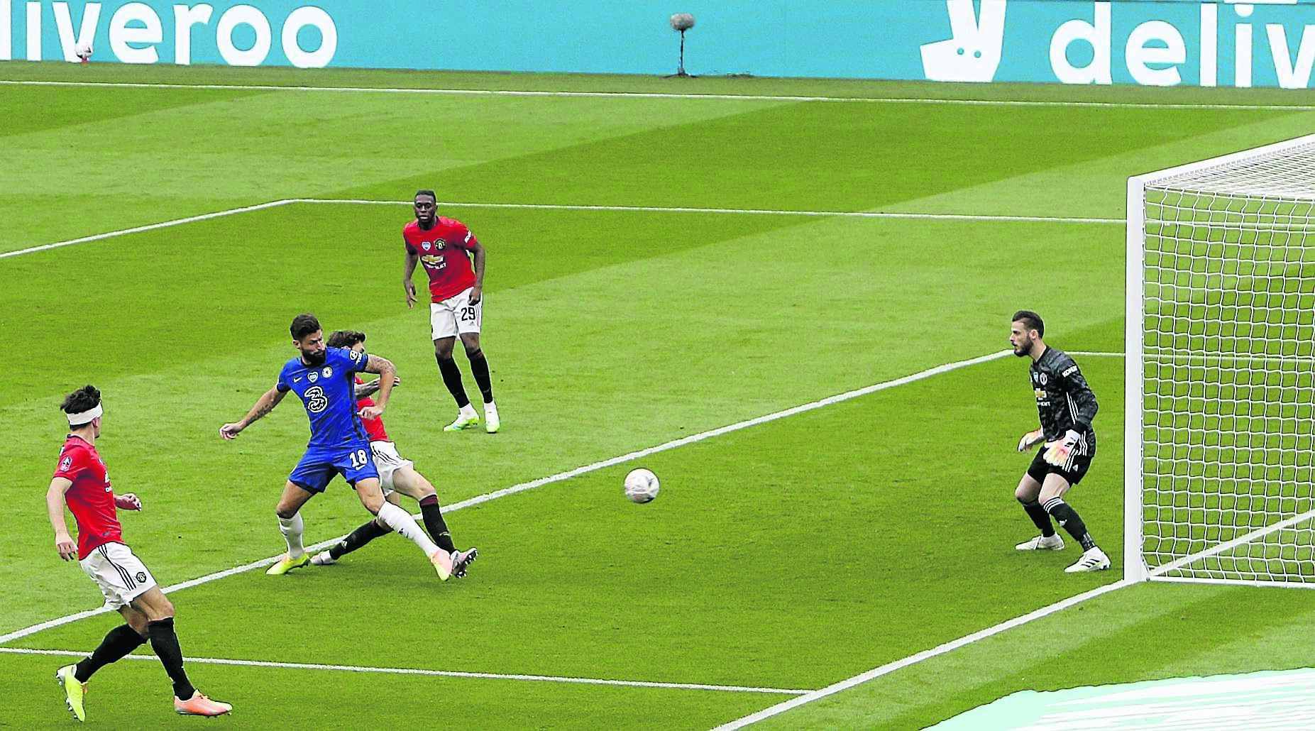 Chelsea's Olivier Giroud scores his side's first goal of the game during the FA Cup Semi-Final match at Wembley Stadium