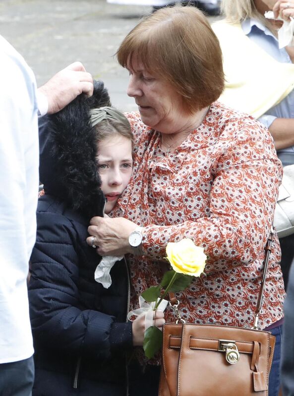 Ruth Morrissey’s daughter Libby carrying a yellow rose following Requiem Mass for her mum today. Photograph Liam Burke/Press 22 Ruth Morrissey’s daughter Libby carrying a yellow rose following Requiem Mass for her mum today. Photograph Liam Burke/Press 22