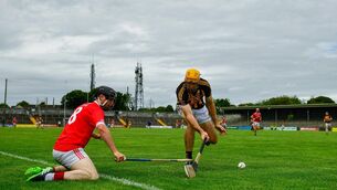 Gary Brennan of Ballyea in action against Eanna McMahon of Crusheen 