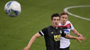 Lee Desmond of St Patrick's Athletic and Dundalk's David McMillan in action at Oriel Park. Photo by Stephen McCarthy/Sportsfile