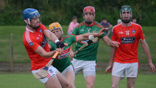 <p class="contextmenu internal_Caption">Kilworth’s Will Condon clears the sliothar upfield despite the attention from Mark O’Keeffe of Fr O’Neills during the Co Op Superstore Cork Hurling Championship match at Ballinoe. Picture: Howard Crowdy</p>