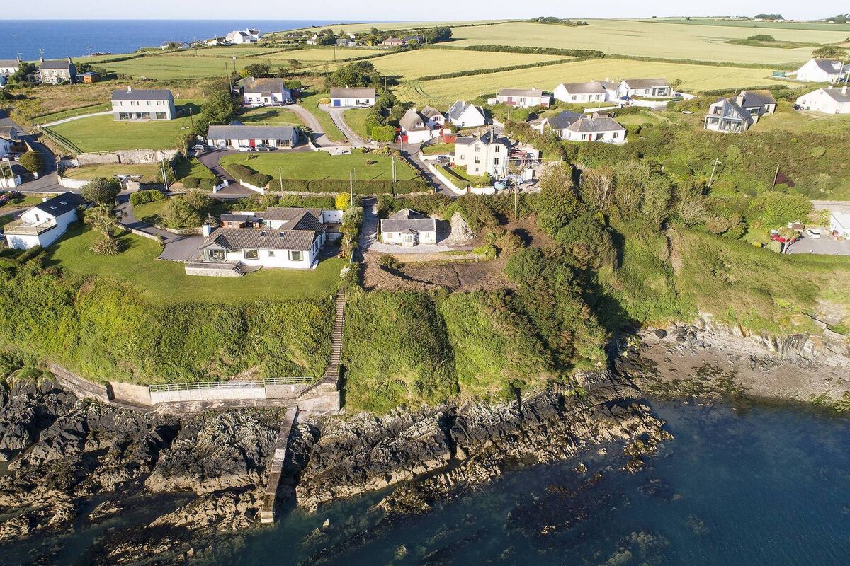 Now dismissed as derelict, 'Aughavanagh', a mid-1900s bungalow at Ballycotton is priced as a site with Hegarty Properties and marketed at €550,000. Now dismissed as derelict, 'Aughavanagh', a mid-1900s bungalow at Ballycotton is priced as a site with Hegarty Properties and marketed at €550,000.