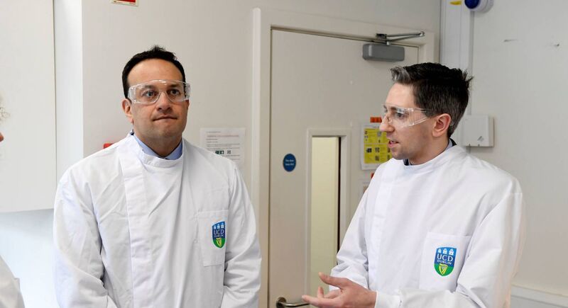 Taoiseach Leo Varadkar and Minister for Health Simon Harris (right) during a visit to the UCD National Virus Reference Laboratory, University College Dublin, in Belfield, Dublin. (Aidan Crawley/PA Wire)