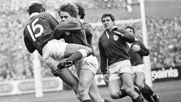 Irish winger Trevor Ringland tackles Welsh full-back Gwyn Evans. Picture: Irish Examiner Archive