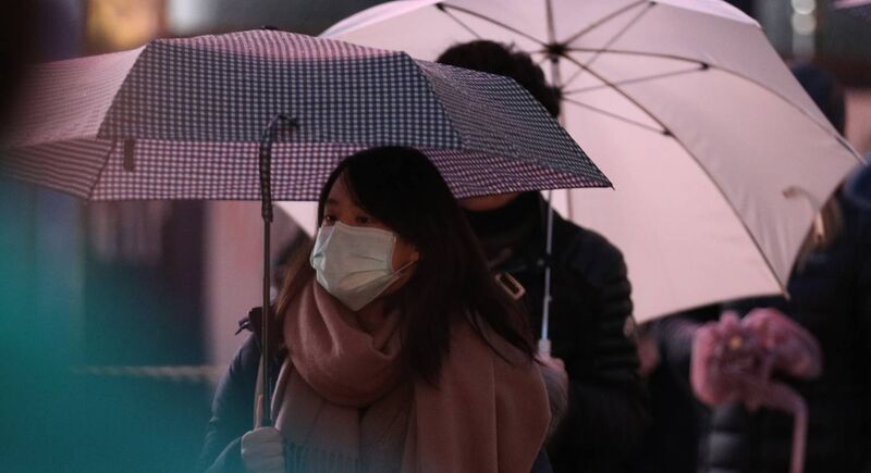 A woman wearing a face mask in central London. PA Photo. Picture date: Wednesday March 4, 2020. The UK has seen its biggest day-on-day increase in coronavirus cases, with 87 people now confirmed to have the virus. See PA story HEALTH Coronavirus. Photo credit should read: Yui Mok/PA Wire A woman wearing a face mask in central London. PA Photo. Picture date: Wednesday March 4, 2020. The UK has seen its biggest day-on-day increase in coronavirus cases, with 87 people now confirmed to have the virus. See PA story HEALTH Coronavirus. Photo credit should read: Yui Mok/PA Wire