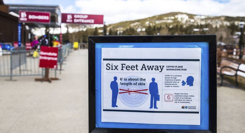 A sign near the Breckenridge ski resort gondola in Breckenridge, Colorado outlines public health guidelines about social distancing to limit the spread of the coronavirus.	Picture: Liz Copan/AP
