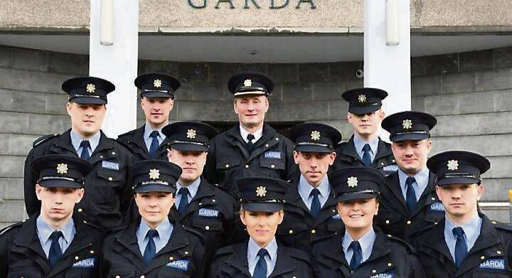 Chief Superintendent Barry McPolin with the 11 probationer gardaí who have been assigned to the Cork City Garda Division.