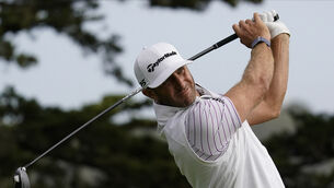 Dustin Johnson watches his tee shot on the 14th hole during the second round of the PGA Championship golf tournament at TPC Harding Park, in San Francisco. Picture: AP Photo/Jeff Chiu