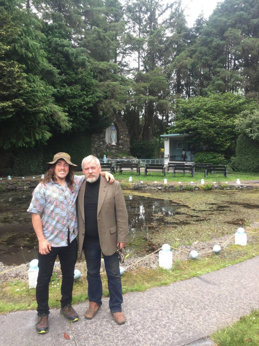 James O'Sullivan with his son, Matthew, at Tubrid Holy Well, Millstreet.