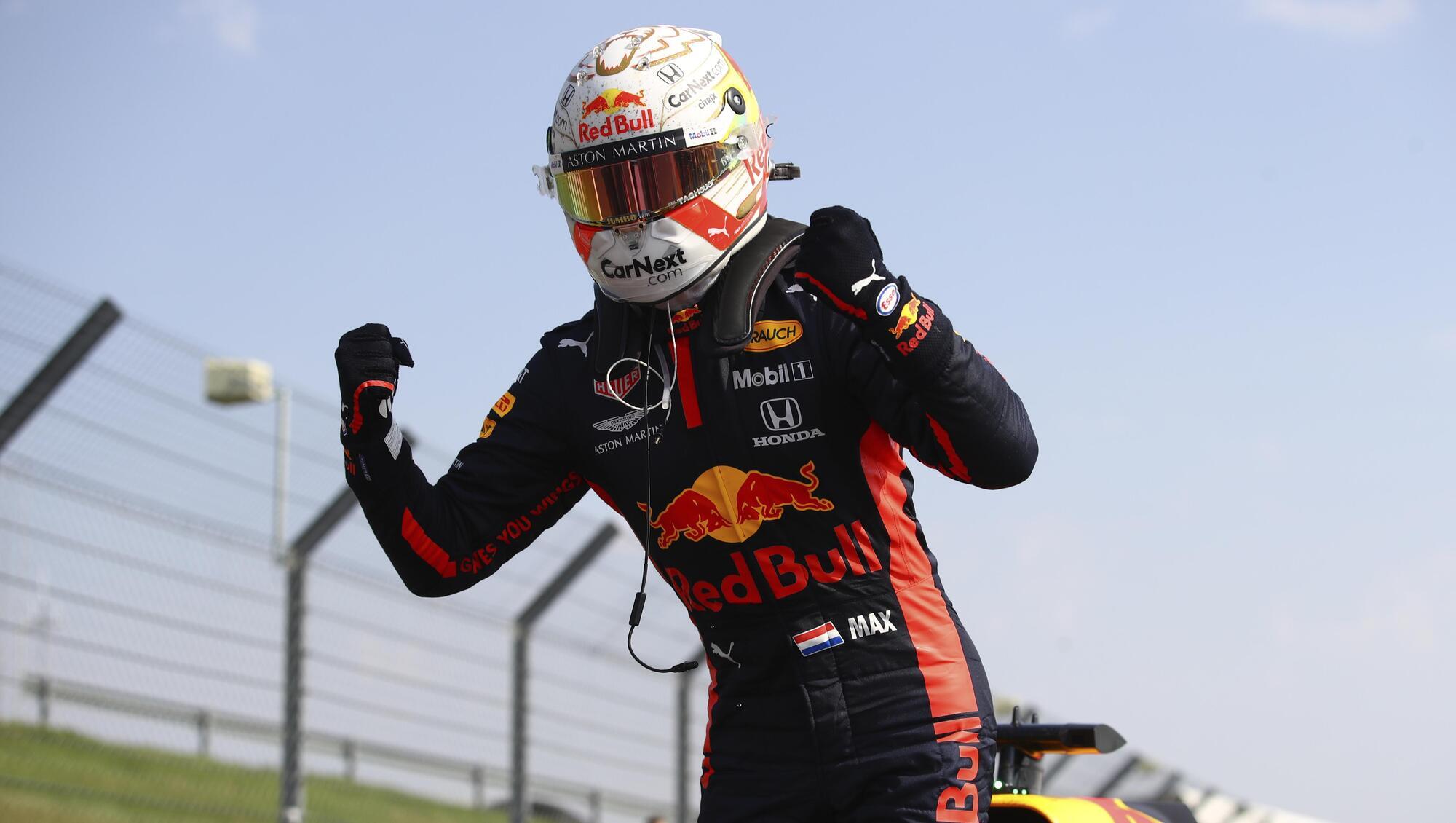Max Verstappen storms to unlikely win as Lewis Hamilton fights back for second