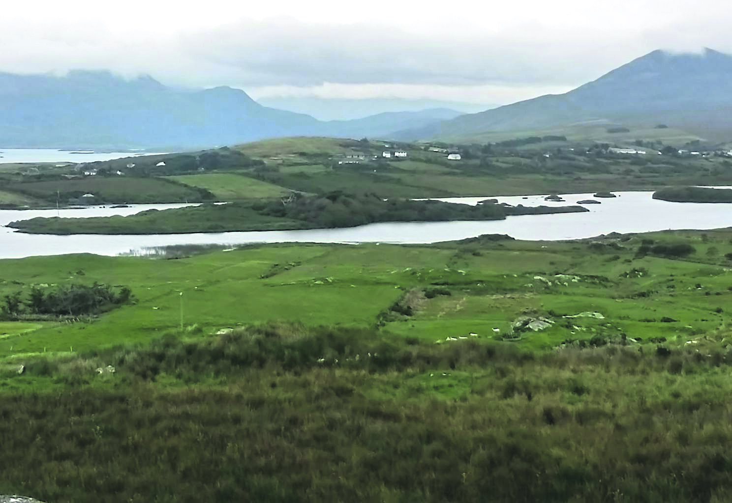 Heather Island (centre) Renvyle, Co Galway. Inset: Former residence of the writer Oliver St John Gogarty on the island. 	Pictures: Dan MacCarthy
            