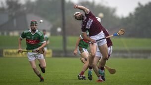 Anthony Fealy, Causeway, and Shane O’Donoghue, Crotta O’Neill’s, in action at Austin Stack Park. Photo By Domnick Walsh