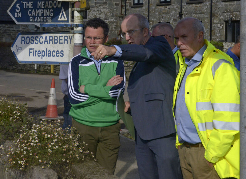 NEWS 18/8/2020 Pictured at Rosscarbery Co Cork was Patrick ODonovan T.D., Minister of State with responsibility for the Office of Public getting a tour of the flooded communities by Ezra McManamon of the OPW and Tim Lucey CEO Cork County Council. Picture: Denis Boyle