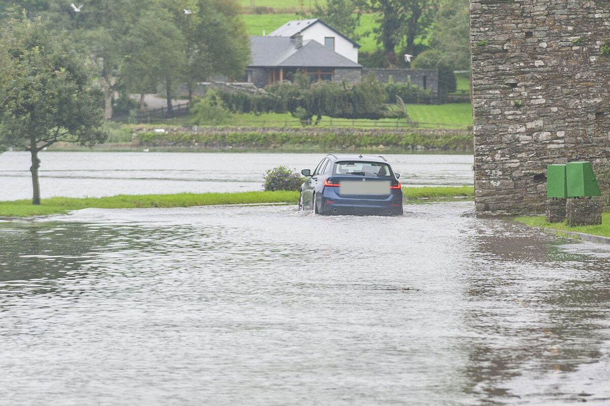The road under Timoleague Abbey flooded badly at high tide this evening. Picture: Andy Gibson.
