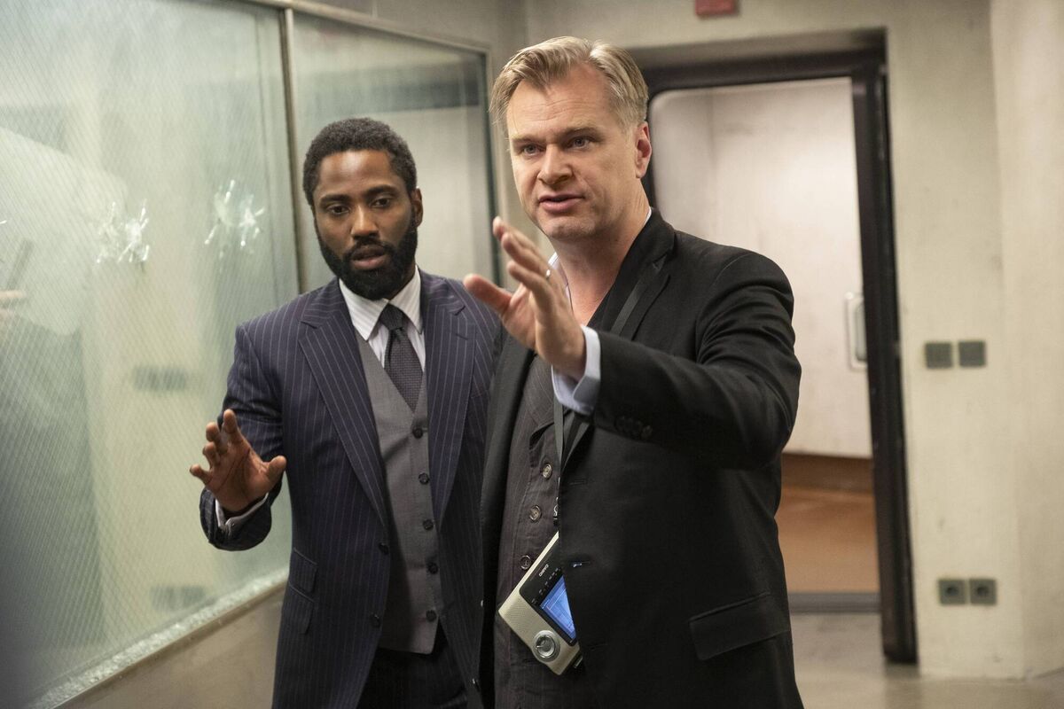 John David Washington on the  set  of Tenet with director  Christopher Nolan.