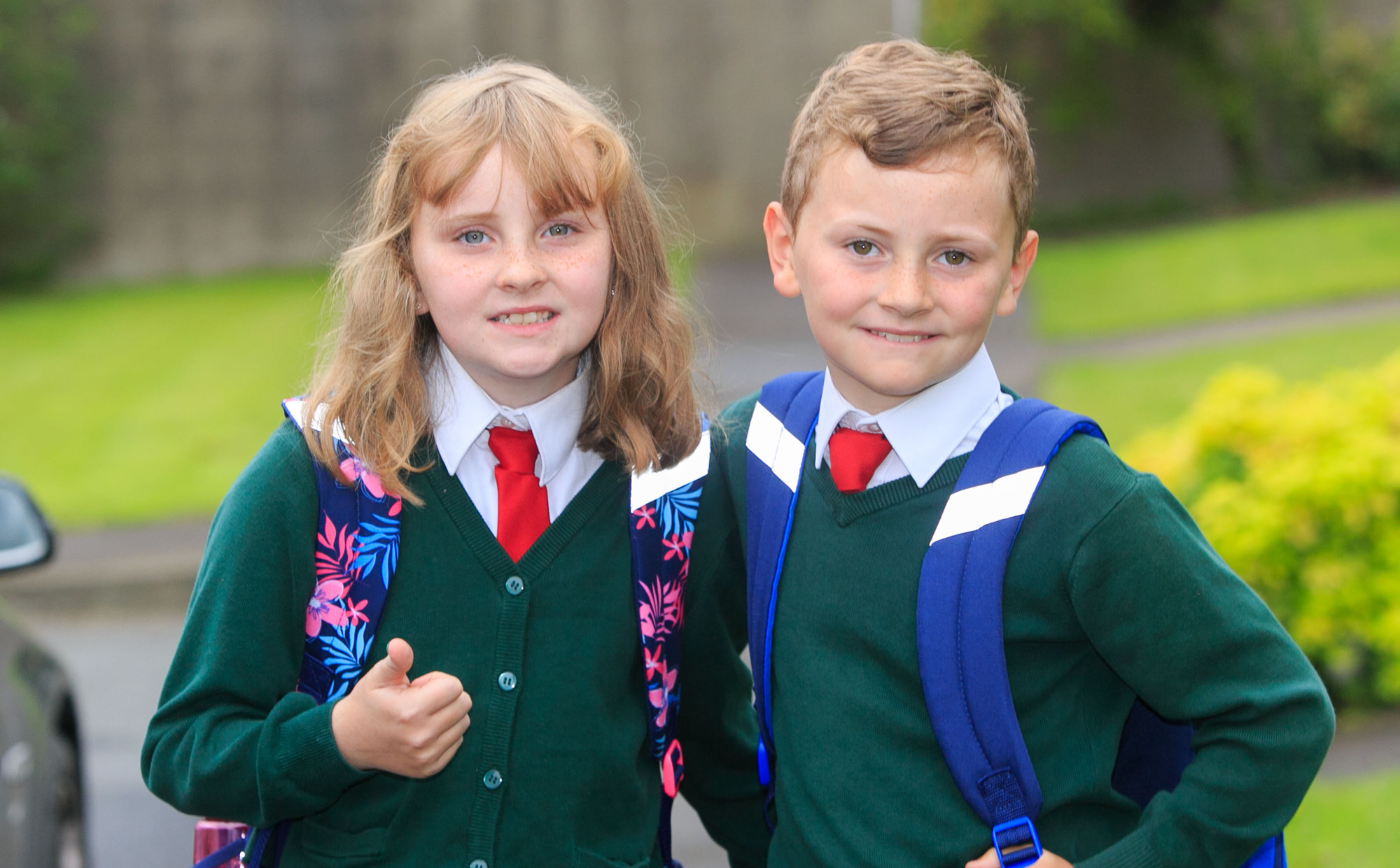 Smiles and tears as children return to school 