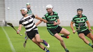 Luke O'Farrell, Midleton, Cillian O'Donovan, Douglas battling it out at Páirc Uí Chaoimh.
            Picture: Jim Coughlan.