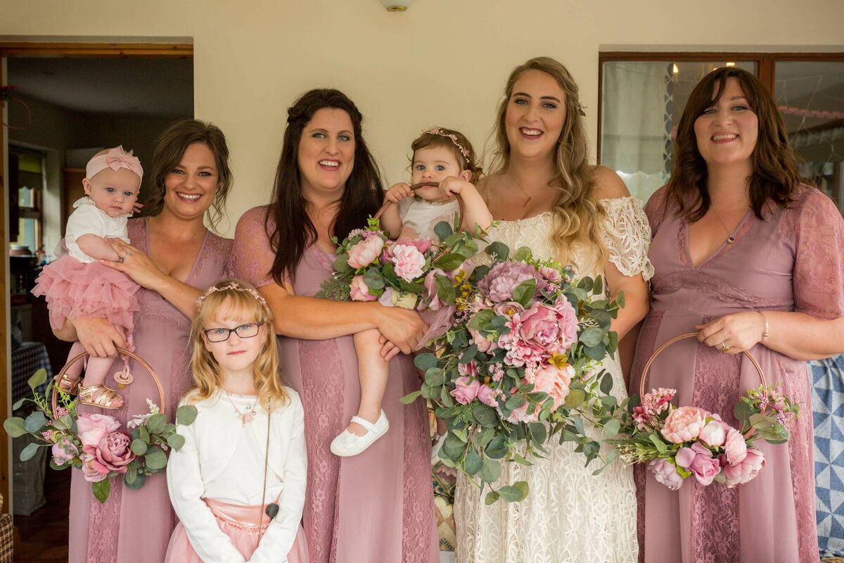 Cathy with bridesmaids Jenny and Lucy Reid and Nicole McGee with the flower girls. Cathy with bridesmaids Jenny and Lucy Reid and Nicole McGee with the flower girls.