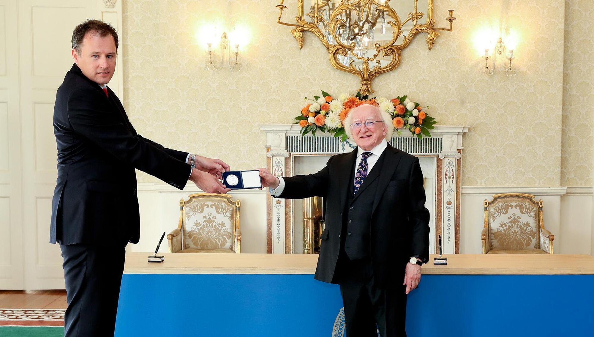 New Agriculture Minister Charlie McConalogue receives his Seal of Office from President Michael D. Higgins.
