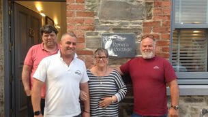 <p>The family of a Youghal mum who lived in over 50 houses in a lifetime of travelling have renovated a 200 year-old riverside cottage in gratitude for making every place a happy home throughout their journeys. Left to right: Liam, Kieren, Rena and Michael Ahern </p>