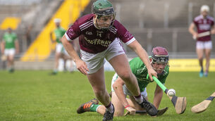 <p>Billy Lions, Causeway, and Darragh Slattery, Ballyduff, pictured in action during the game. Picture:Domnick Walsh © Eye Focus LTD</p>