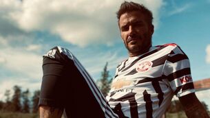 <p>David Beckham wears Man Utd's new third alternate kit for 2020-21</p>