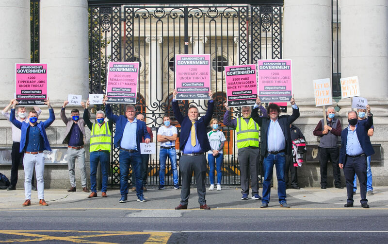 Publican TJ McInerney of TJ Macs pub Tipperary during a protest by publicans due to a Covid 19 closure of pubs which do not serve food at Government Buildings, Dublin. Publican TJ McInerney of TJ Macs pub Tipperary during a protest by publicans due to a Covid 19 closure of pubs which do not serve food at Government Buildings, Dublin.
