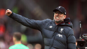 Liverpool manager Jurgen Klopp celebrates their victory after the final whistle at the Premier League match at Anfield, Liverpool.