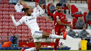 <p>Liverpool's Mohamed Salah (right) has a shot blocked by Leeds United's Tyler Roberts during the Premier League match at Anfield, Liverpool. PA Photo. Picture: Phil Noble/NMC Pool/PA Wire.  </p>