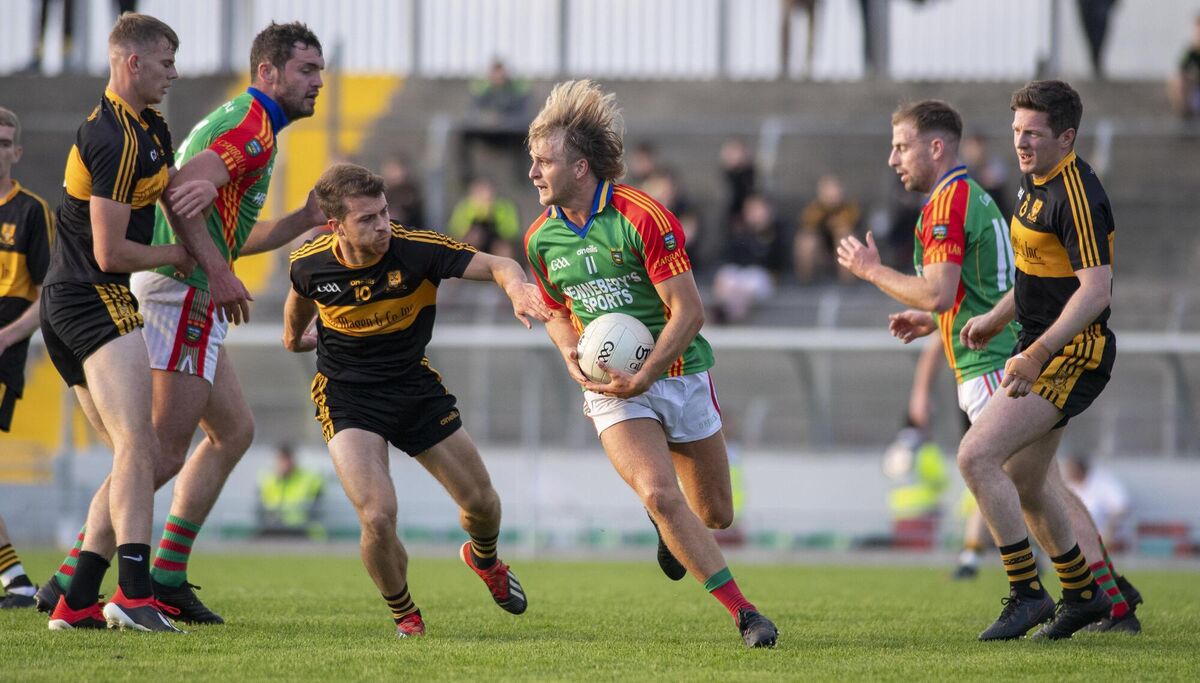 Cillian Fitzgerald of Dr Crokes tracks Mid Kerry's Fiachra Clifford at Austin Stack Park. Picture: Domnick Walsh Cillian Fitzgerald of Dr Crokes tracks Mid Kerry's Fiachra Clifford at Austin Stack Park. Picture: Domnick Walsh
