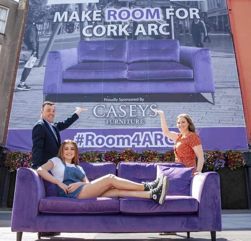 Mia Dorney, centre, at the unveiling of the #Room4ARC banner on Grand Parade last year. Mia is heading to CIT to study business information systems.  File picture: Brian Lougheed