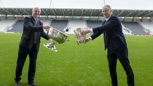 <p>Today, Wednesday, September 16, marks the 30th Anniversary of the historic 'Double Senior All Ireland ' Victories of 1990 – when both Cork senior teams made history by capturing both the Liam MacCarthy and Sam Maguire trophies. Pictured at Pairc Uí Chaoimh swapping the famous trophies are captains Tomás Mulcahy (hurling captain, on right) and Larry Tompkins (football captain). Picture: Brian Lougheed</p>