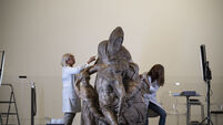 Restorers uncover new details in Michelangelo sculpture