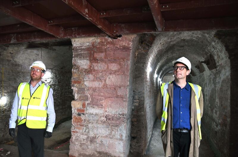 Paul Kenneally, development manager, BAM Property, (left) and Gareth O'Callaghan, director, JCA Architects, at the old tunnels which are being incorporated into the reception area in the Counting House. Picture Denis Minihane. Paul Kenneally, development manager, BAM Property, (left) and Gareth O'Callaghan, director, JCA Architects, at the old tunnels which are being incorporated into the reception area in the Counting House. Picture Denis Minihane.