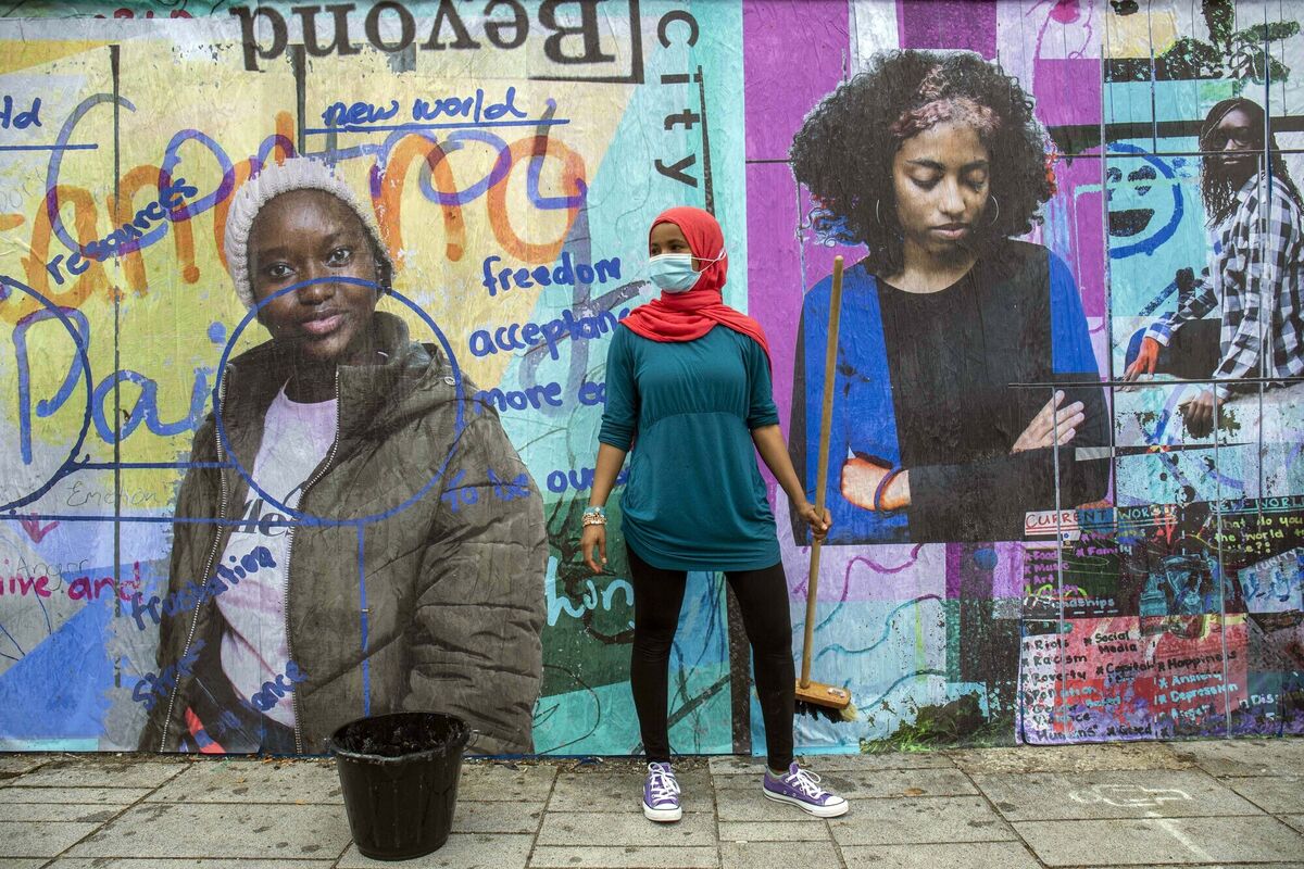   Sadiya Ahmed at Kyrl’s Quay in Cork city hanging a new public artwork  created by a group of imaginative teenagers in partnership with the Glucksman, UCC.  Picture: Clare Keogh 