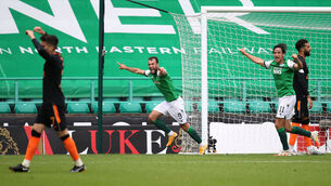<p>Hibernian's Christian Doidge (centre) celebrates. Photo: Andrew Milligan/PA Wire. </p>