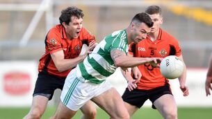 <p>Valley Rovers' Fiachra Lynch gathers the ball from Duhallow's Bart Daly and Shane Hickey at Páirc Uí Rinn. <span class="contextmenu emphasis">Picture: Eddie O'Hare</span>
            </p>