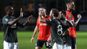 <p>Manchester United’s Juan Mata (centre) celebrates opening the scoring. Picture: Catherine Ivill/PA</p>