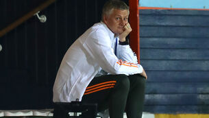<p>Manchester United manager Ole Gunnar Solskjaer sits in the stands at Luton. Picture: Catherine Ivill/PA</p>
