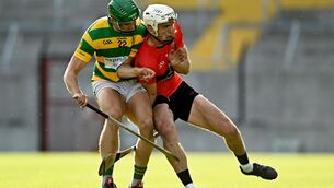 <p>UCC's David Griffin in action against John Cashman of Blackrock at Páirc Uí Chaoimh in Cork. Photo by Eóin Noonan/Sportsfile</p>