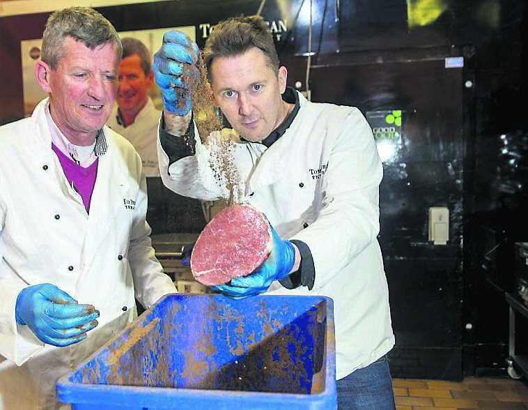 Young Offenders actor, Shane Casey, and Tom Durcan trying out a taste of spiced beef in the English Market.   