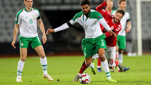 <p>Ireland's Cyrus Christie with Lasse Schone of Denmark. Picture: INPHO/Ryan Byrne</p>