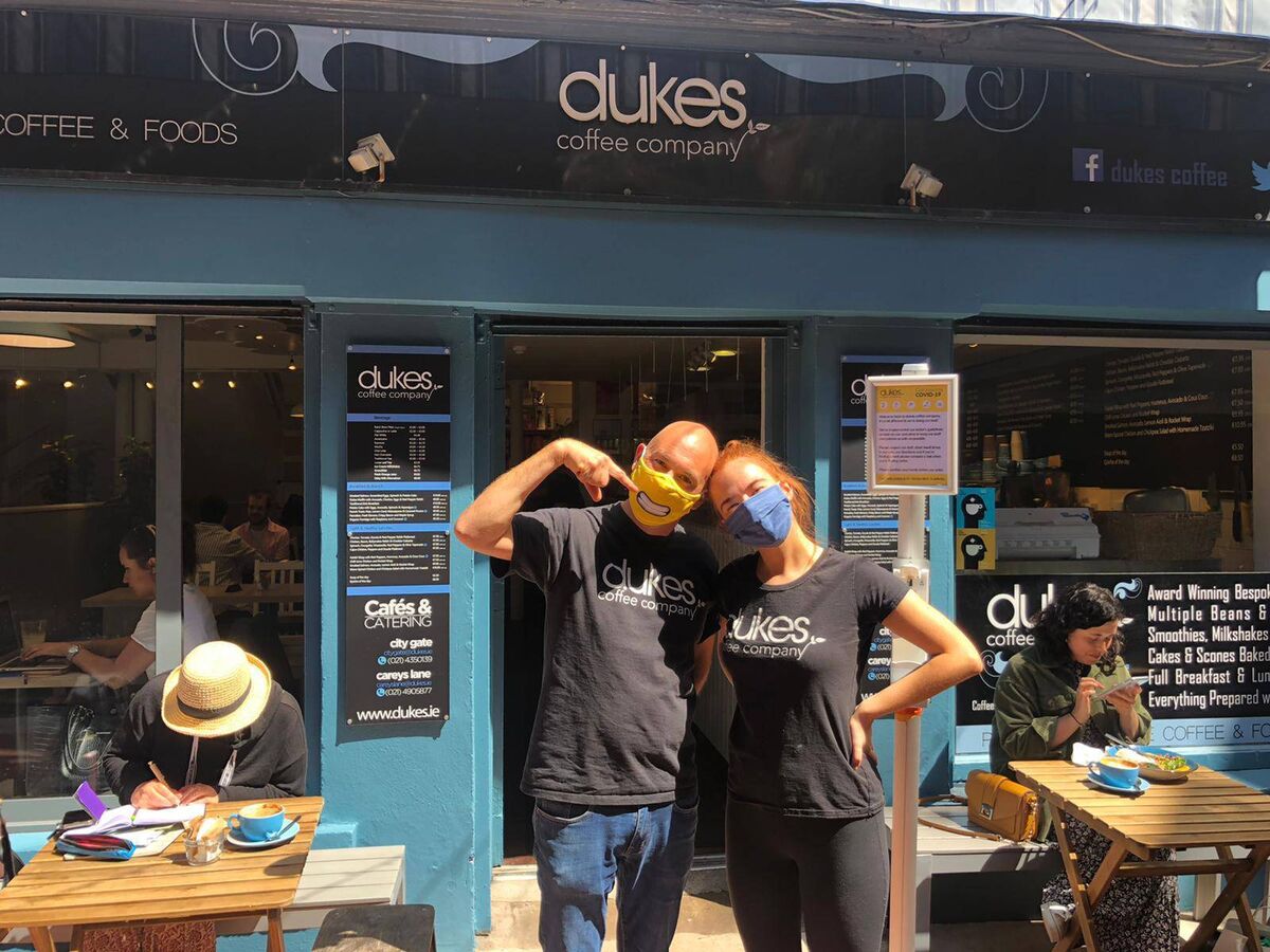 Aidan Duke &amp; Bonnie Meehan outside Dukes coffee Company on Careys Lane.