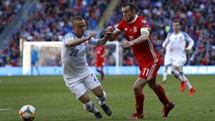 <p>Slovakia's Stanislav Lobotka goes up against Wales' Gareth Bale in their Euro 2020 qualifier at the Cardiff City Stadium. Photo: PA</p>