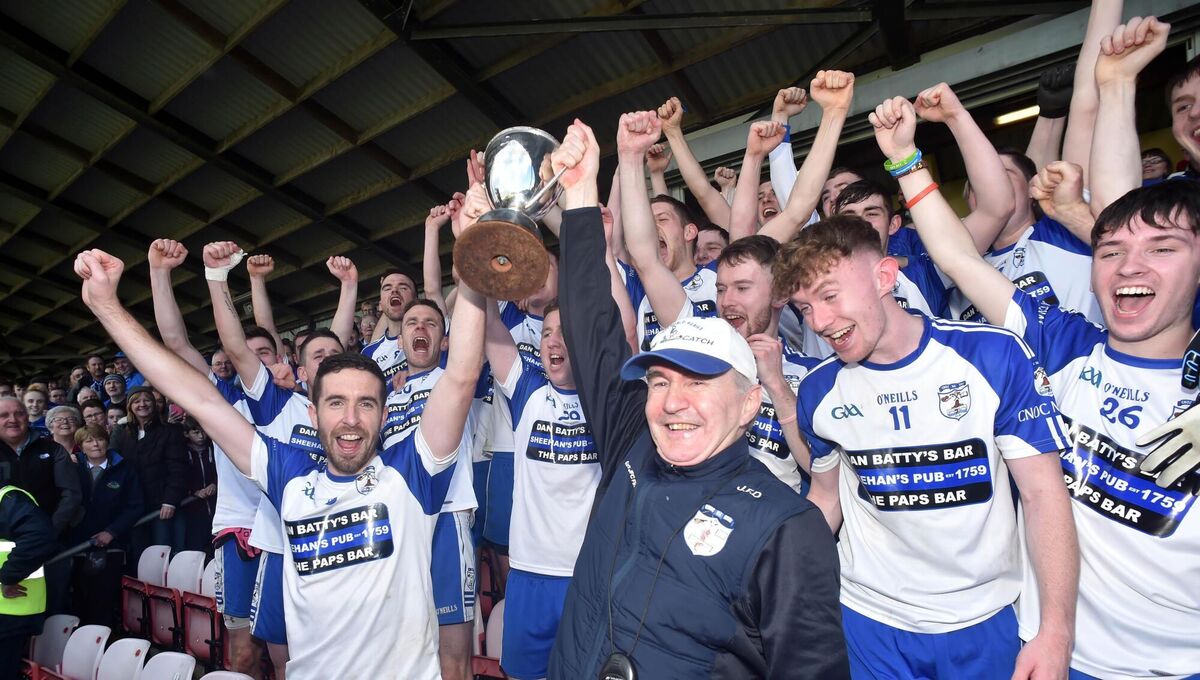 Knocknagree's manager/coach John Fintan Daly and captain Matthew Dilworth raise the trophy after defeating Erins Own in the Cork county JAFC final in 2017. Picture: Eddie O'Hare