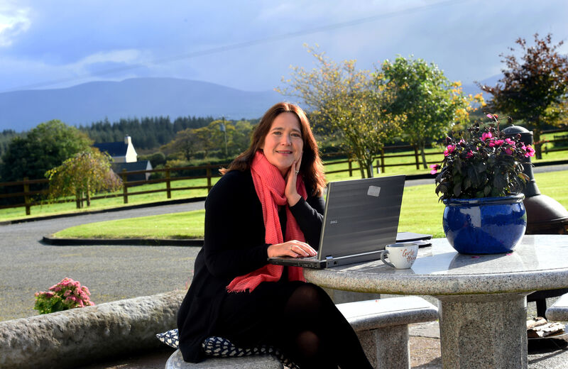  Mairead O'Sullivan with the Caha mountains in the background. "It’s a once-in-a-lifetime opportunity to future-proof the village of Knocknagree, to bring life back into the heart of our beautiful village."Picture: Larry Cummins