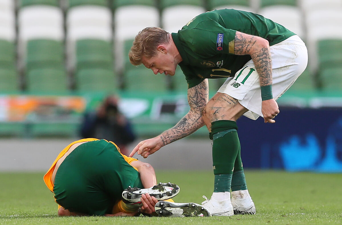 Republic of Ireland's James McClean (right) reacts after fouling Wales' Ethan Ampadu, which resulted in a red card. Picture: Brian Lawless
