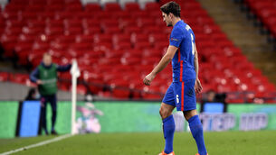 <p>Harry Maguire walks off the pitch. Picture: PA</p>