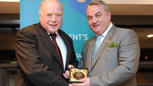 <p>Jimmy O’Mahony is presented with a GAA President’s Award by GAA President Nickey Brennan in 2009. Newcestown official Donie Keane said: ‘Jimmy linked the past with the present. He kept contact with players who had moved away and kept them abreast of what was happening — but he also made modern players, the youngsters, aware of their heritage.’</p>